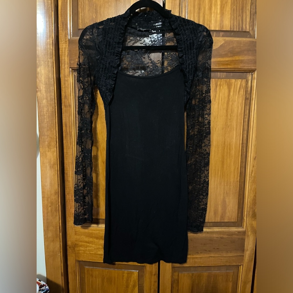 Black dress with sequences body central size small